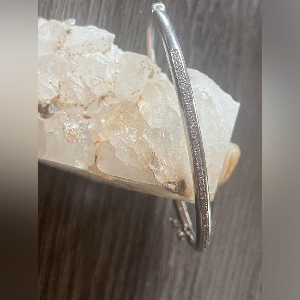 Beautiful solid sterling silver bangle with genuine diamonds.💎